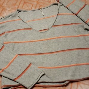 By Free People size large vneck sweater